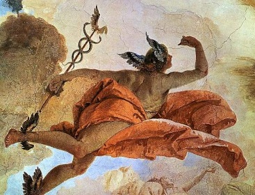A colorful Baroque fresco of Hermes soaring through the clouds, away from the viewer, with a crimson cloak billowing around His midriff. In His left hand is the golden caduceus of the modern style — that is, with a pair of wings perched at the top of the staff and the two snakes coiling in a double-helix down the rod.